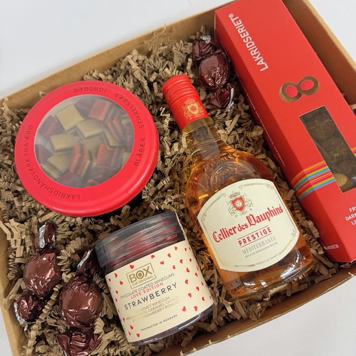 Gaveæske med rosévin og vingummi