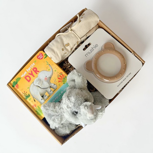 Sød barselsgave med elefantbamse, børnebog, en stofble og en bidering