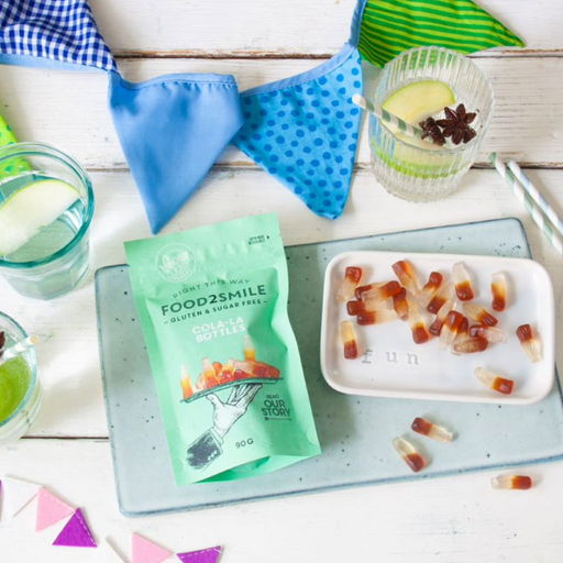 Veganske og sukkerfri cola-vingummier – bløde slikstykker med klassisk colasmag uden gluten, perfekt som en ansvarlig snack med masser af smag.