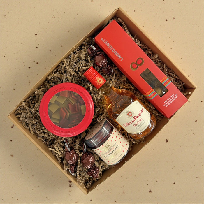 Gaveæske med rosévin og vingummi