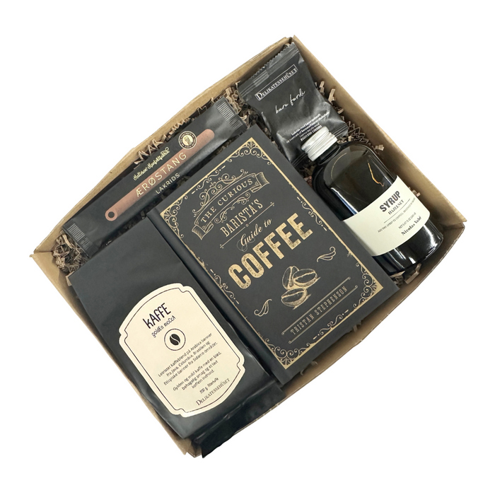 Gaveløsning med alt til kaffen, gaven indeholder bog om kaffe, kaffe og kaffesirup