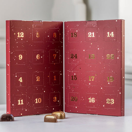 Julekalender fra Xocolatl med 24 stykker fyldt chokolade. Bestil online ved Delikatessehuset