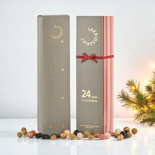 Luksuriøs lakrids-julekalender fra Lakridseriet med 24 dage fyldt med håndplukkede lakridsspecialiteter – fra salte klassikere til chokoladeovertrukne dragéer. Perfekt til 1–2 personer som en delevenlig gourmetoplevelse.