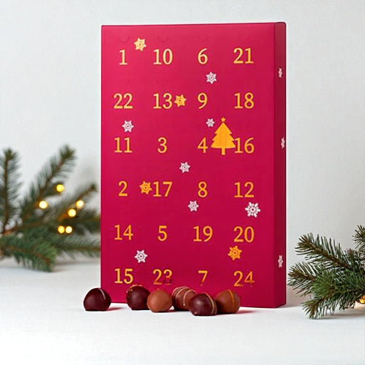 Romkugle julekalender  - luksuriøs pakkekalender med chokoladeovertrukne romkugler i 12 smagsvarianter, perfekt til julens søde stunder