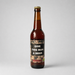 Specialøl med mørkt label og teksten “Give this man a beer” på lys grå baggrund.