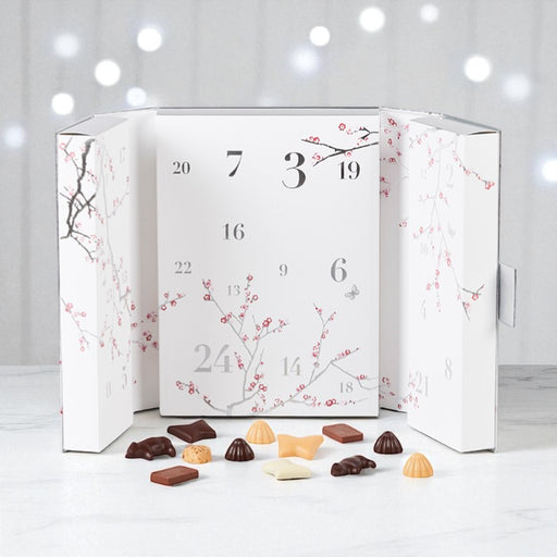 Luksus julekalender med dansk, økologisk premium chokolade – perfekt til at dele eller give som gave.	