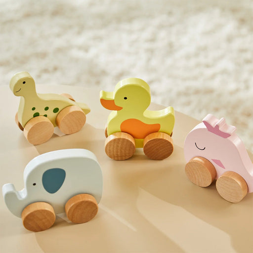 Sødt rullende hval-legetøj til børn fra 3+ måneder.